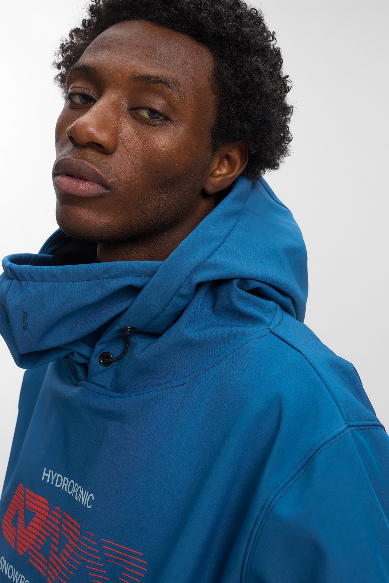 Man in blue jacket, casual fashion look.