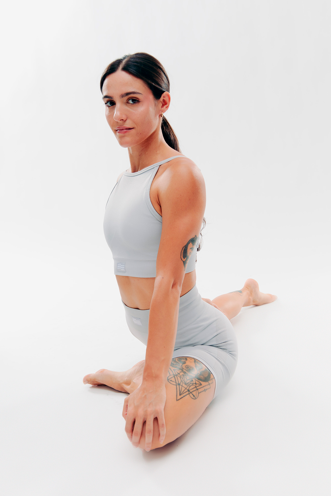 Woman practicing yoga in studio pose